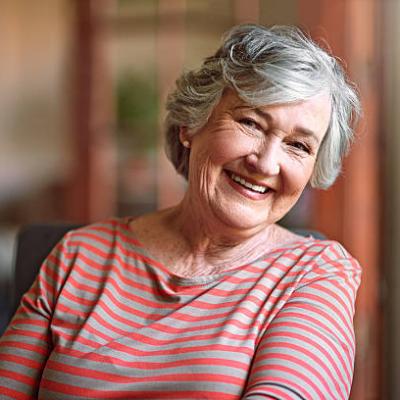 elderly woman smiles